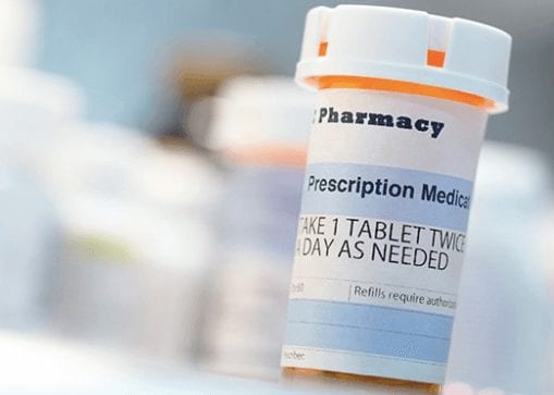 pharmacy prescription bottle with instructions