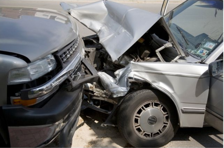 head on collision at low speed with truck and car with crumpled front hoods