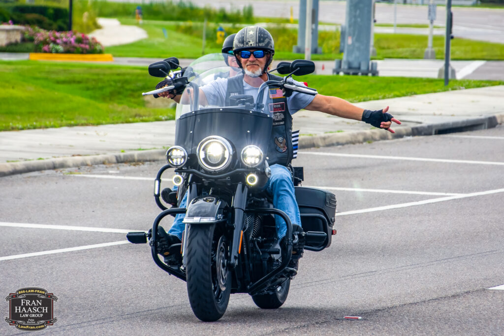 motorcycle riders driving down the road, motorcycle bias matters