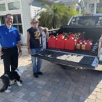 pickup truck full of gas cans for hurricane relief