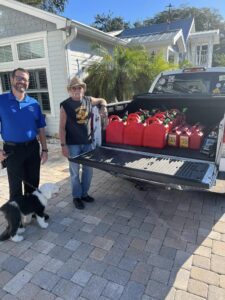 pickup truck full of gas cans for hurricane relief