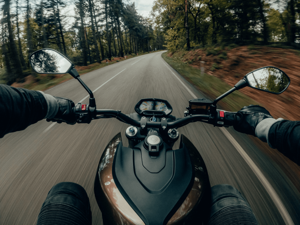 Can I Cancel My Motorcycle Insurance in the Winter?  motorcyclist riding in the winter in florida point of view from the motorcyclist