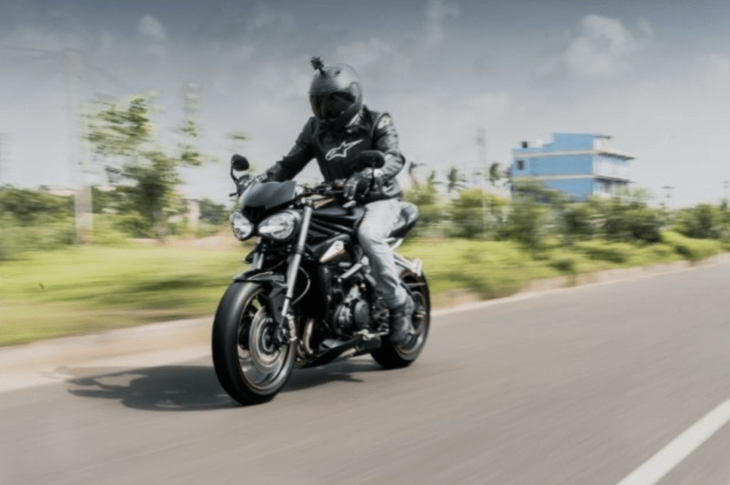 motorcyclist in florida in the winter riding on the road