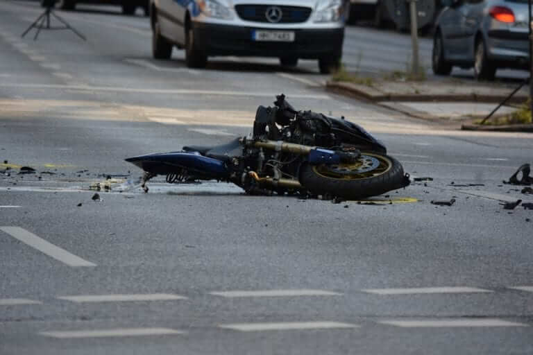 motorcycle crash on the street, broken motorcycle, crash data concept