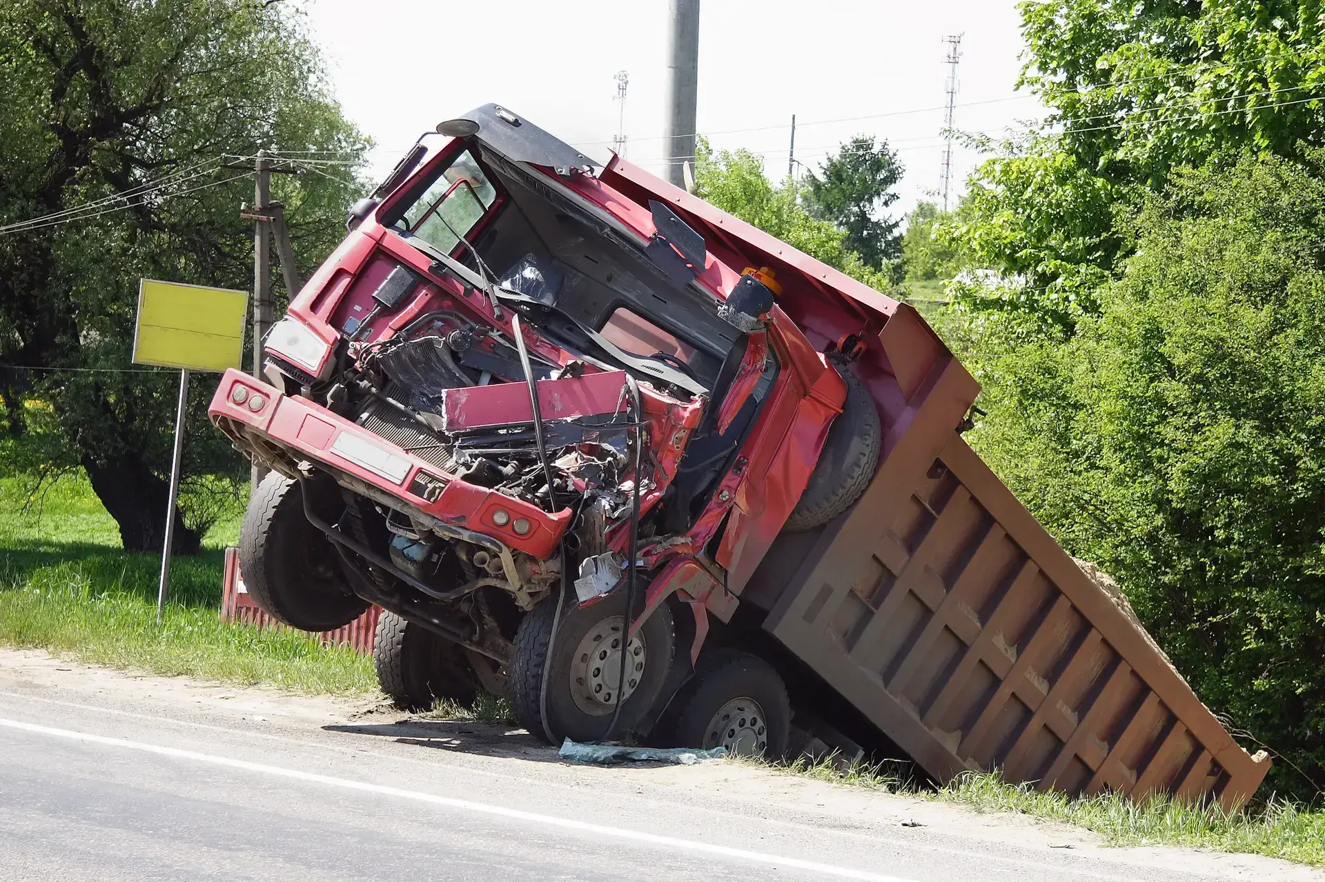 truck accident with a truck fallen off the road