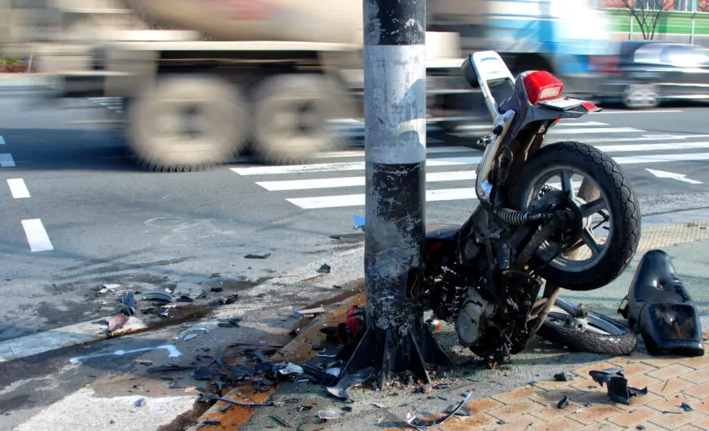 motorcycle accident in tampa, destroyed motorcycle on a street corner