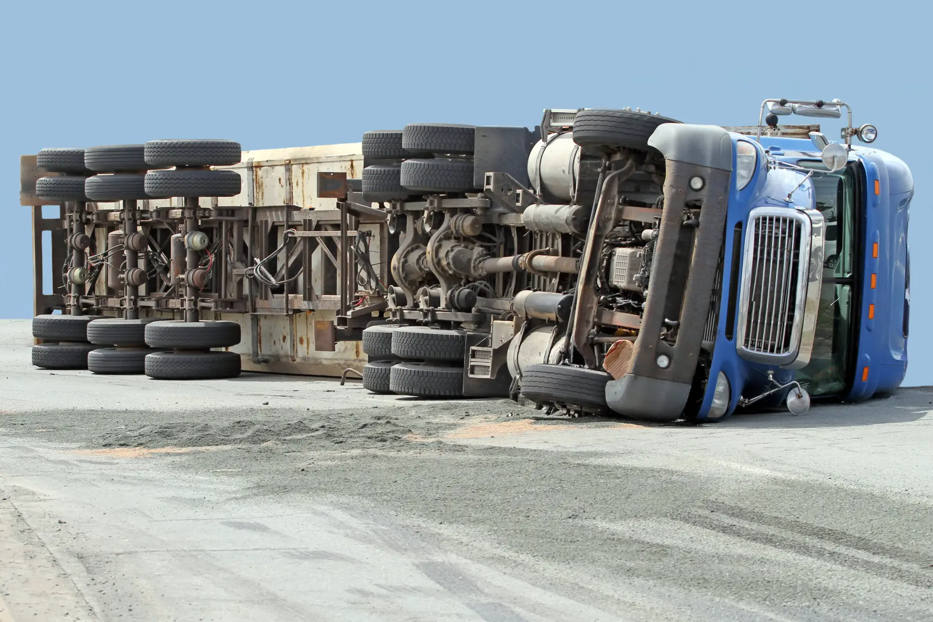 rollover truck accident in tampa, blue truck on its side
