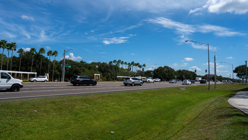 cars driving fast on a tampa road