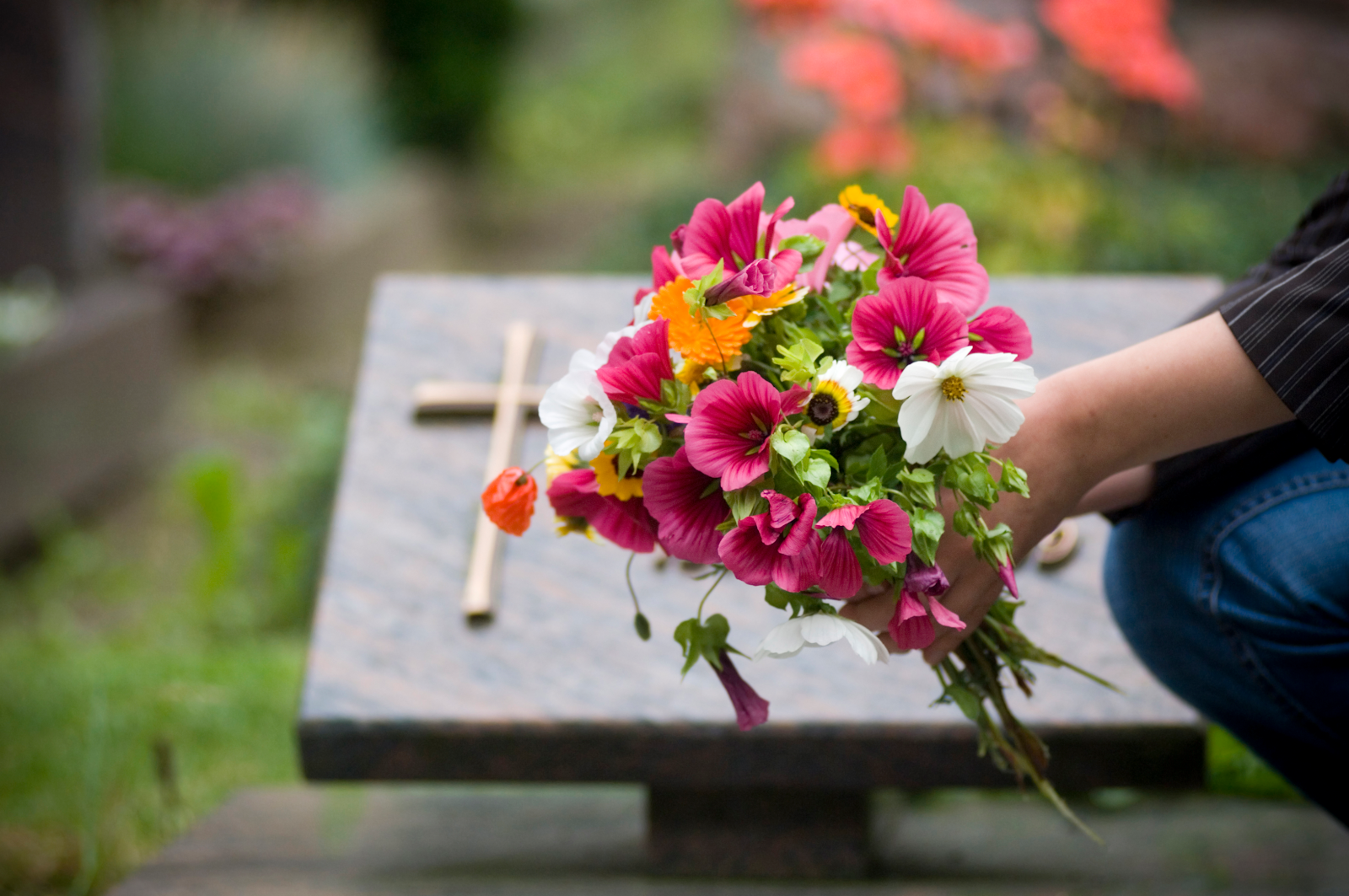 funeral scene, flowers by a grave in new port richey wrongful death case