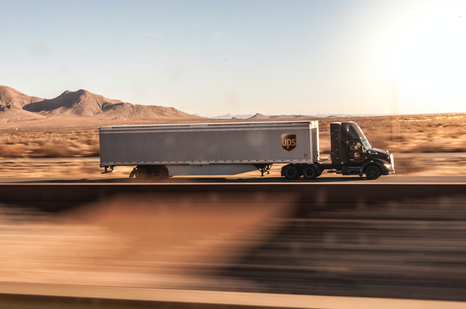 UPS truck on a highway driving fast