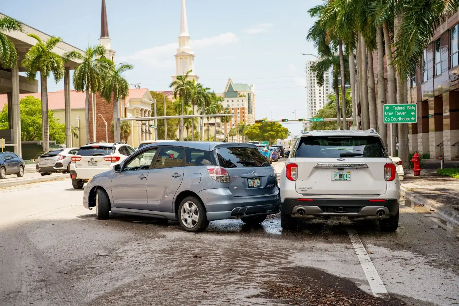 Two cars in an accident on a Florida street.
