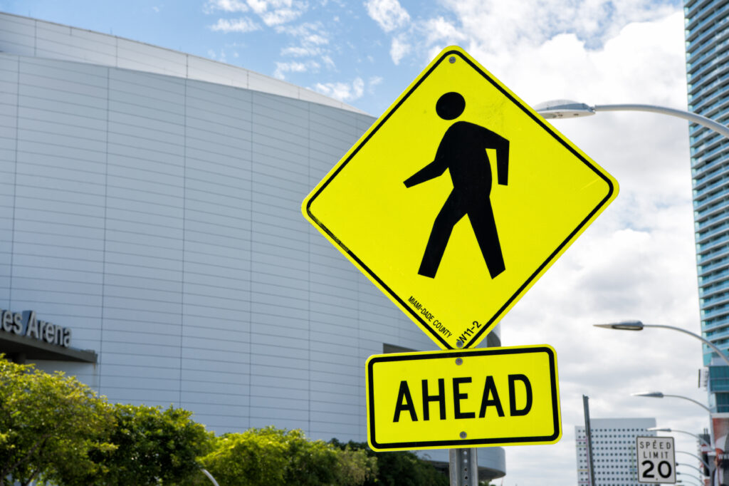A pedestrian crossing sign on a Florida road.