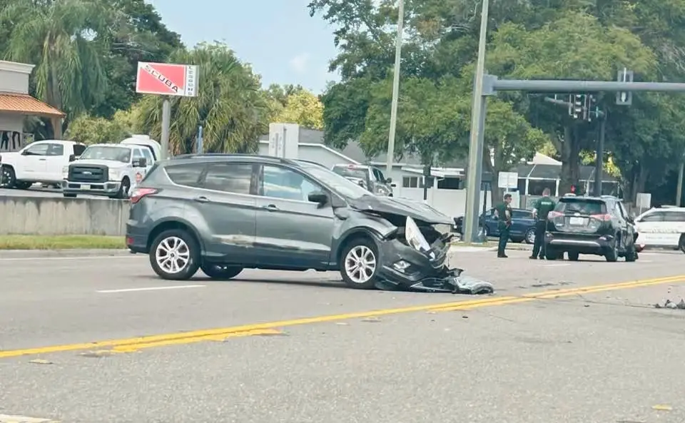 An SUV with front end damage after a car accident on Drew Street in Clearwater, FL.