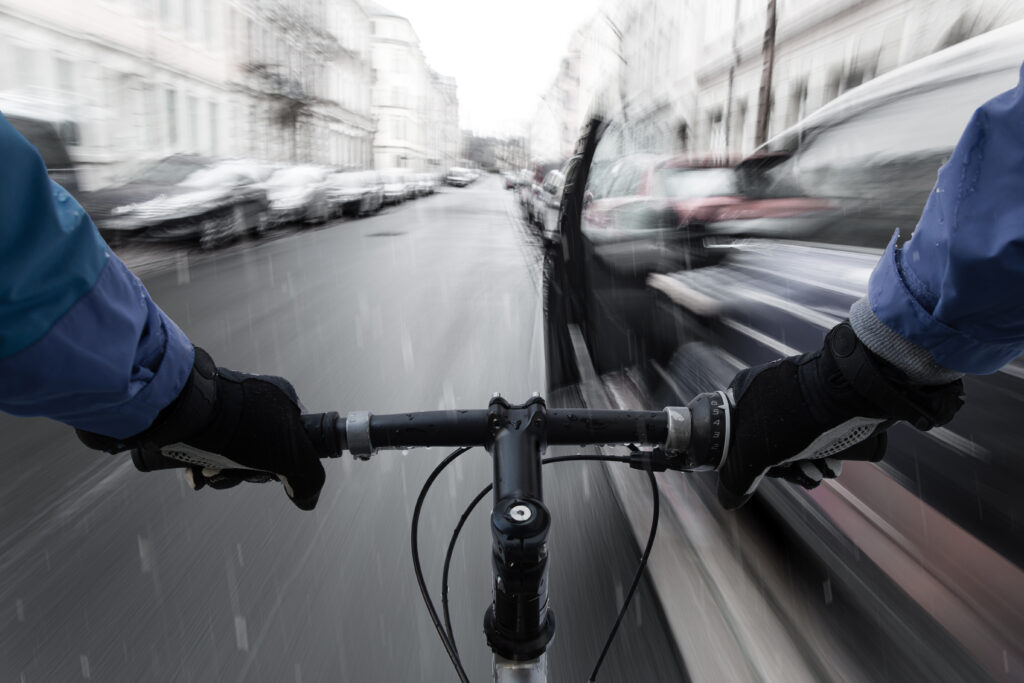 Car-dooring -- Cyclist on a collision course with car door
